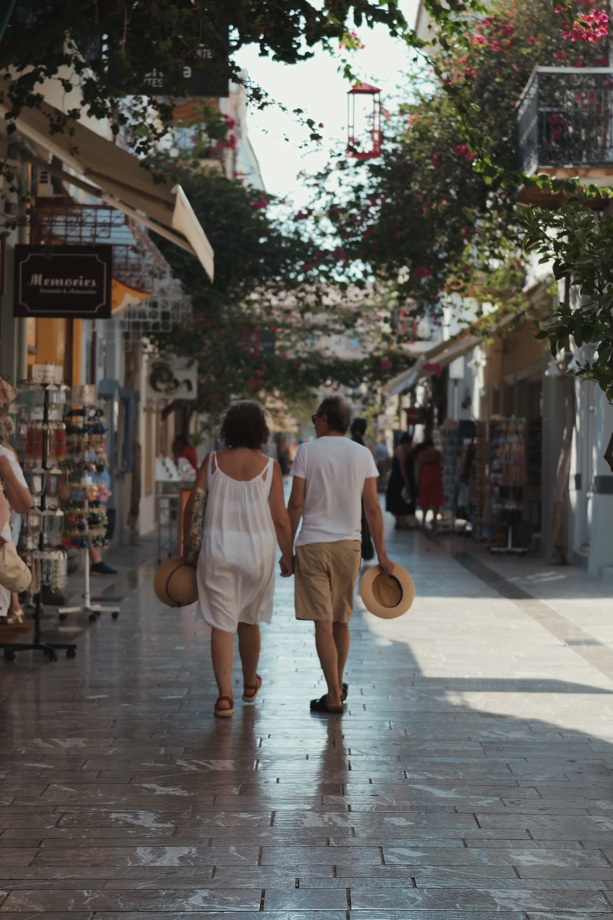 A couple walking through the shopping lane