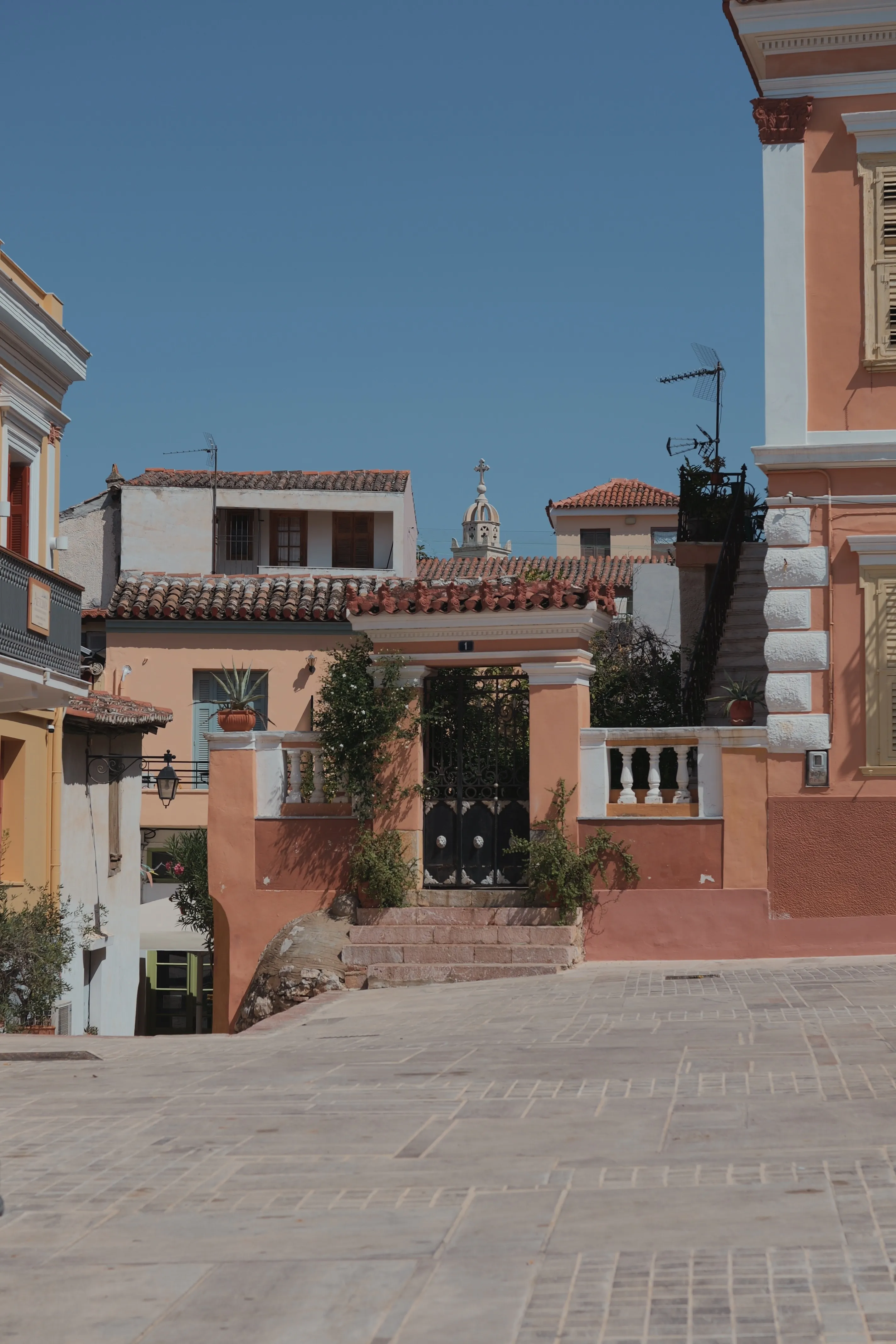 A church and a gated entrance