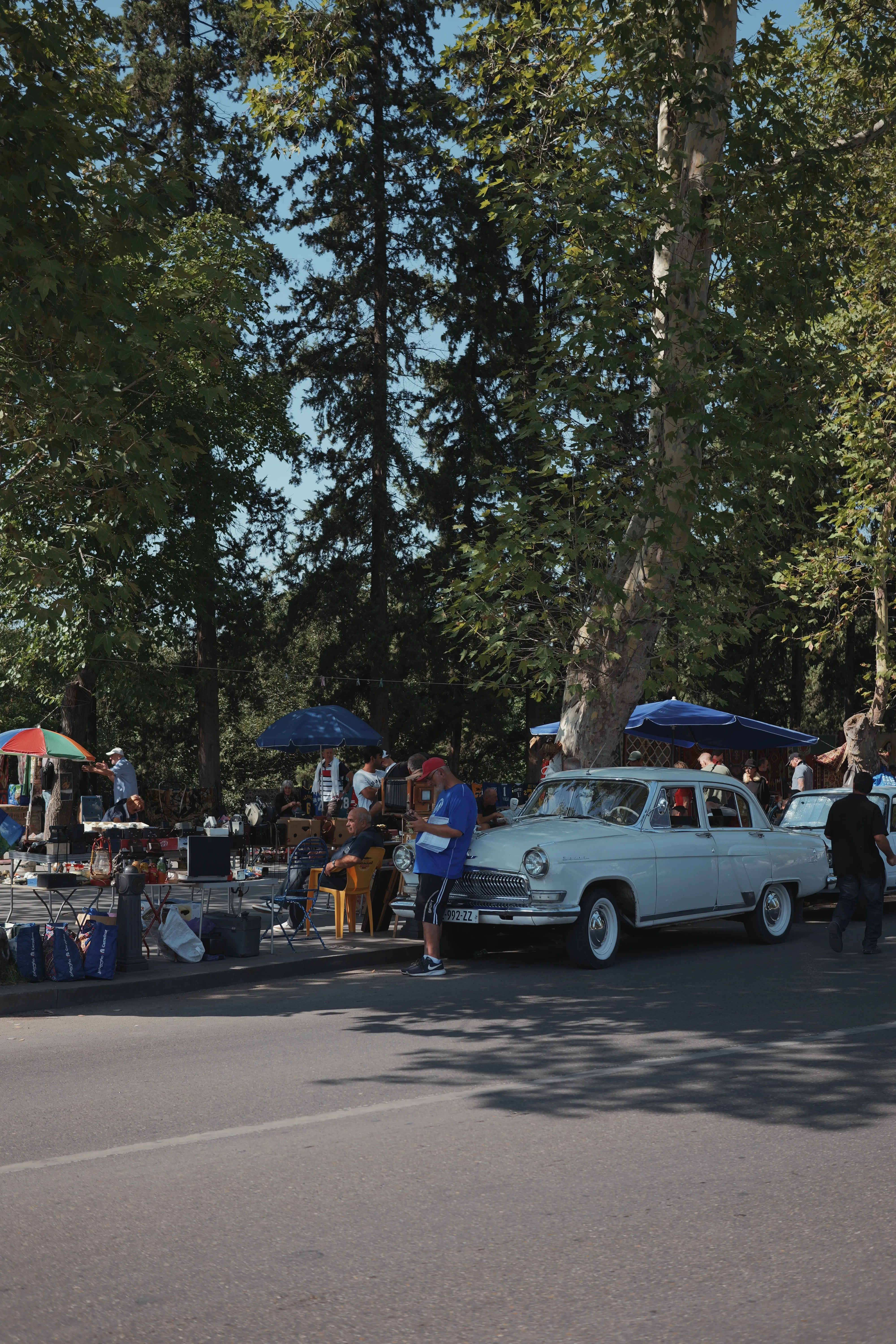 A classic car at a flea market