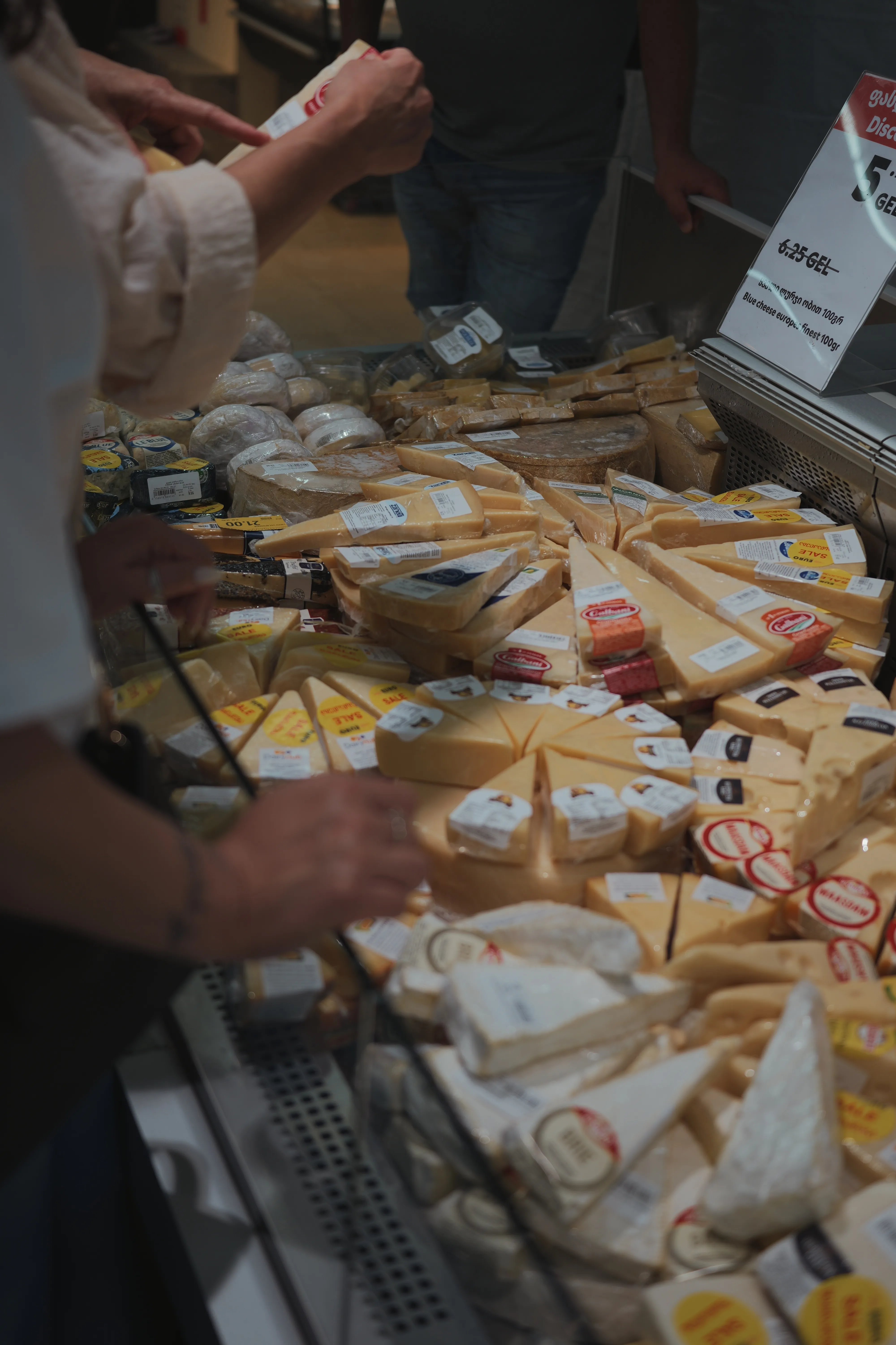 A cheese counter at a market